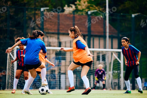 Preview: Female soccer players in action during practice at the stadium.