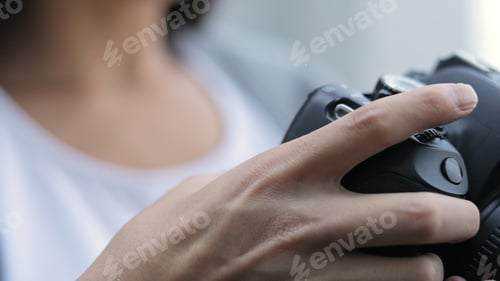 Preview: Female Photographer using digital camera
