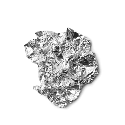 Preview: Crumpled foil from chocolate on isolation top view