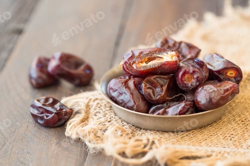 Preview: date palm fruits. Healthy sweet snack food Pile of tasty dry dattes. Date harvest
