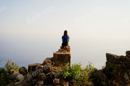 Preview: Female hiker with arms up outstretched on mountain top, inspirational landscape