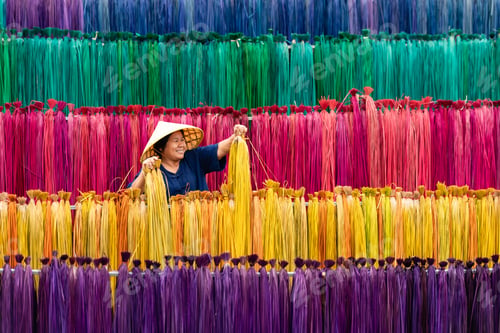 Preview: Processing of flax trees into different colors to be weaved into mats.