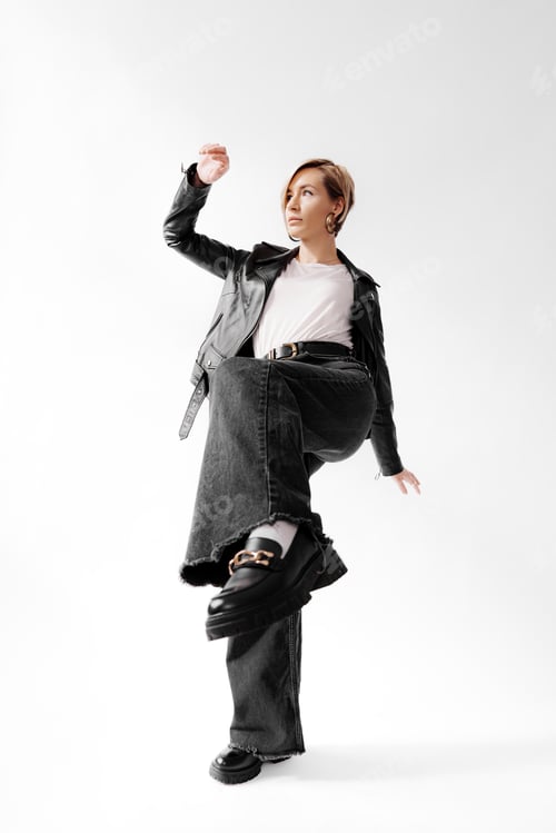 Preview: Stylish woman in leather black jacket