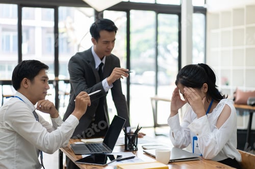Preview: conflict between business workers at workplace, female businesswoman is being threaten by her cowor