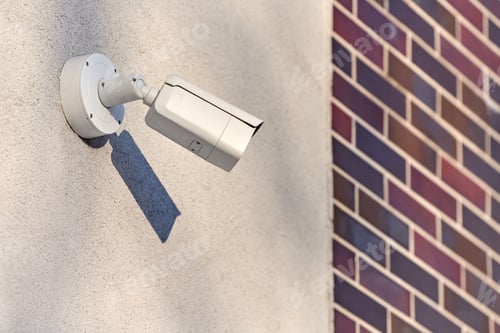 Preview: IP CCTV security camera on concrete wall, urban cityscape