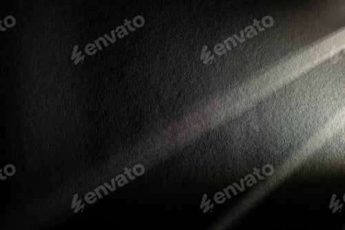 Preview: light prism with beams on dark textured background