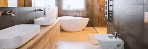 Preview: Stylish bathroom with wooden and concrete walls and white bath