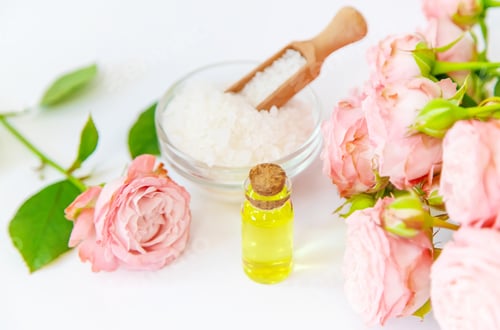Preview: cosmetics with rose flower extract. Selective focus.