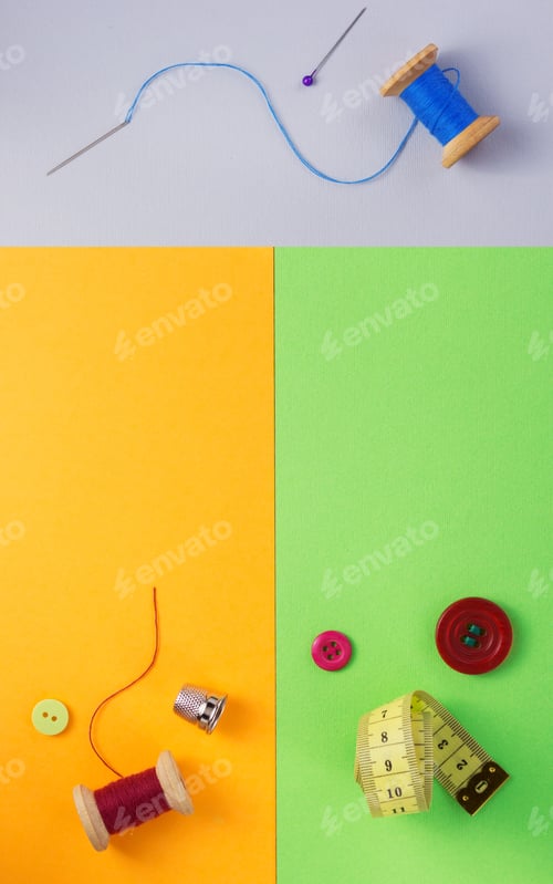 Preview: sewing tools and accessories at paper background