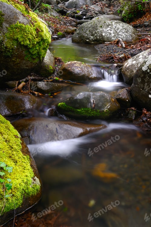 Preview: Stream with waterfall and mossy stones around