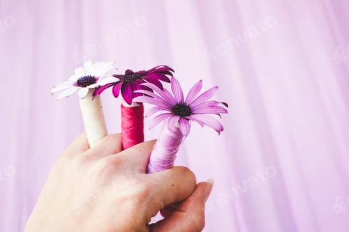 Preview: Close up image with a concept between flowers and couture