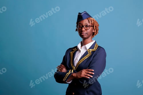 Preview: Stewardess wearing uniform in studio shot