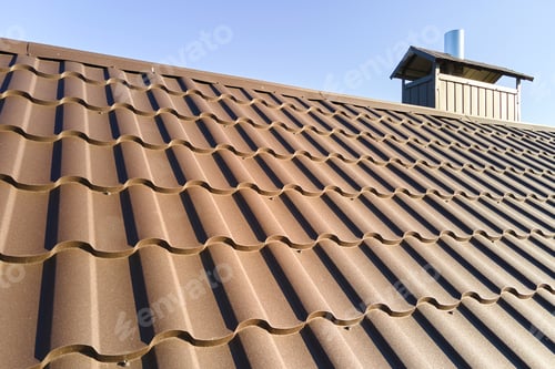 Preview: Closeup of house roof top covered with metallic shingles