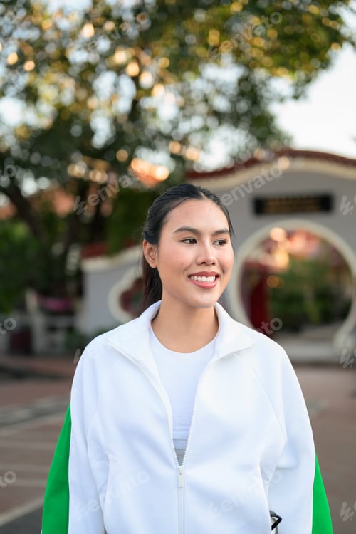 Preview: Young Asian Woman in Sporty Casual Outfit Outdoors
