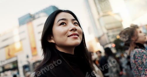 Preview: Walking, happy and Japanese woman in the city for tourist sightseeing in the street on weekend trip