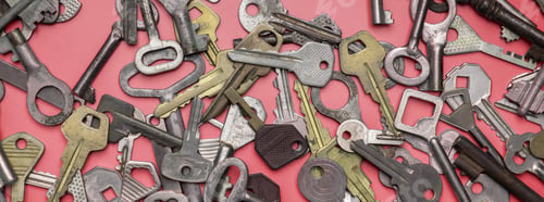 Preview: Keys set on pink background. Door lock keys and safes for proper