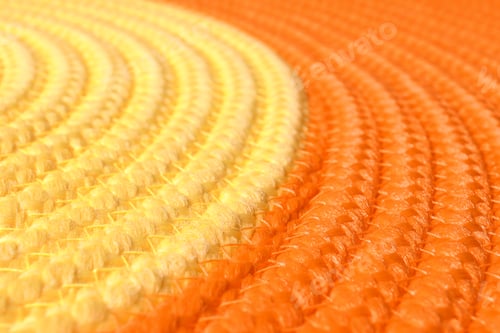 Preview: Orange and yellow wicker mat texture as background, closeup