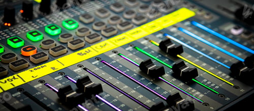 Preview: Sliders and buttons on Audio Mixing Desk at live event