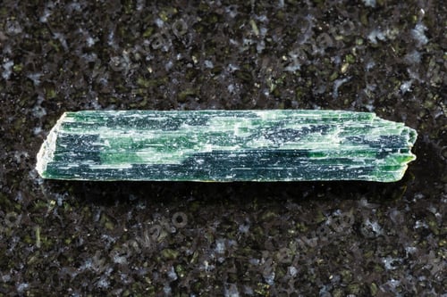 Preview: sample of unpolished chrysotile mineral on black