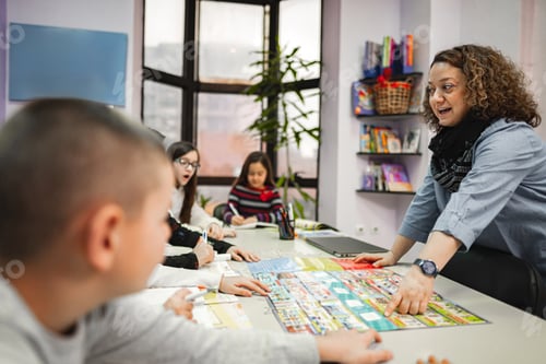 Preview: Woman teaching a group of elementary students at language school