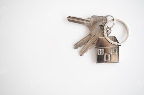 Preview: Businessman Holding House Keys