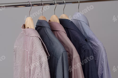 Preview: Shirts Hanging on a Rack for Menswear Concept