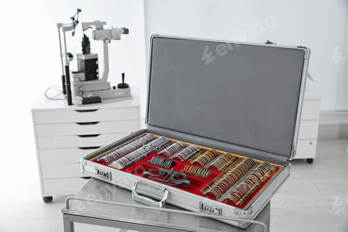 Preview: Case with trial lens set on table. Eye examination