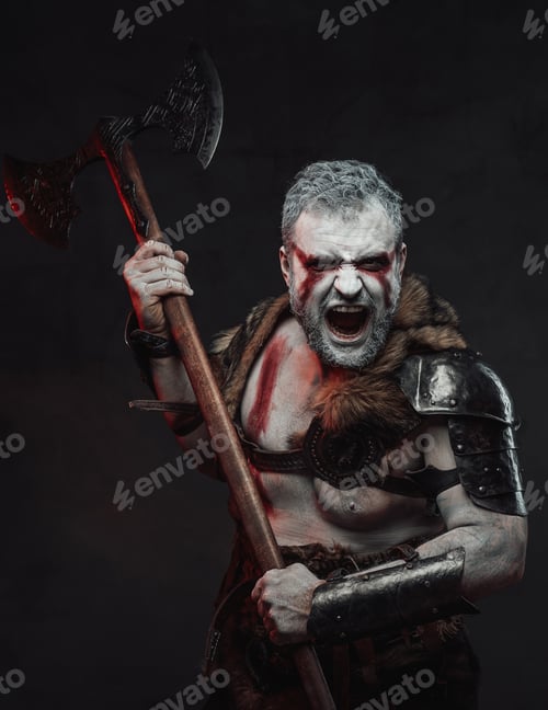 Preview: Atmospheric portrait of medieval fighter with axe in studio