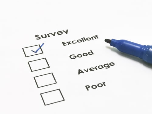 Preview: Customer experience concept with check box and a pen.