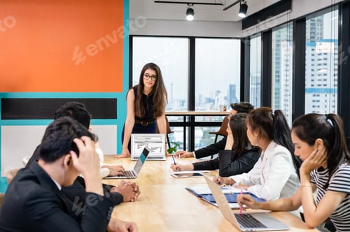 Preview: Multiethnic business team meeting with seriously about financial of company in office