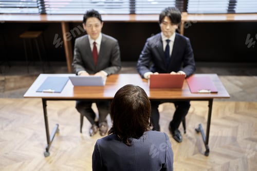 Preview: Asian managerial business person interviewing