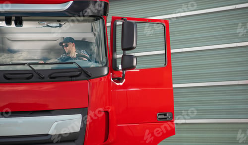 Preview: Trucker Inside His Truck Cabin Preparing For a Route