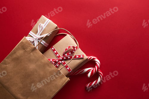 Preview: shopping bag with gift box and christmas decoration. Buying gifts for Christmas