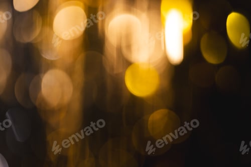 Preview: Yellow bokeh lights with copy space on dark background