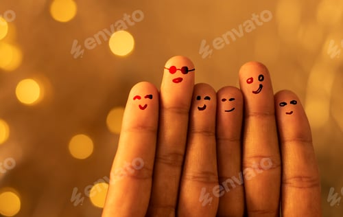 Preview: Finger Family with Drawn Faces Against Blurred Backdrop