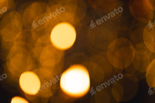 Preview: Multiple yellow bokeh lights with copy space on dark background