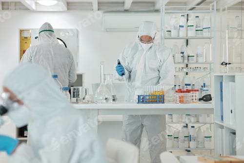 Preview: Researchers Performing Tests in a White Lab Environment