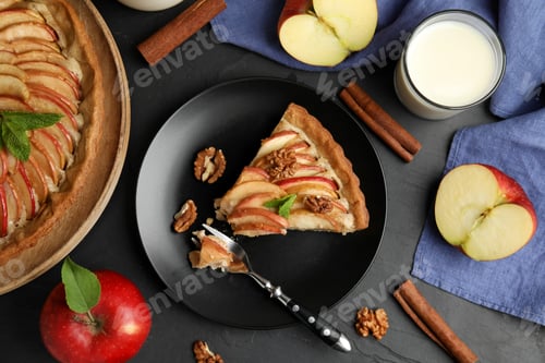 Preview: Delicious apple pie served on black table, flat lay