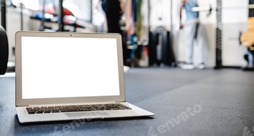Preview: Netbook mock up with white screen placed on floor in gym