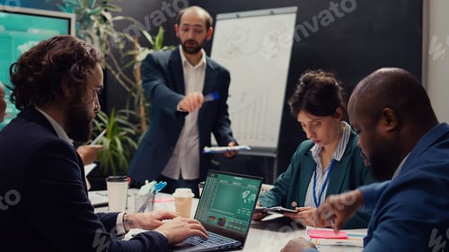 Preview: Team of associates working on resource allocation plans during a meeting