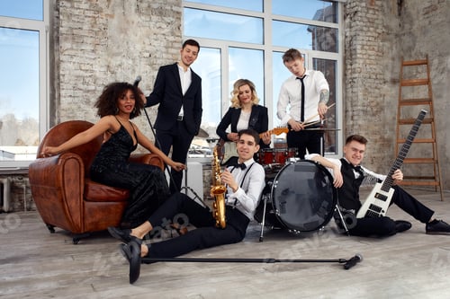 Preview: Young international musicians, a band performing on the loft stage. The concept of music, hobby