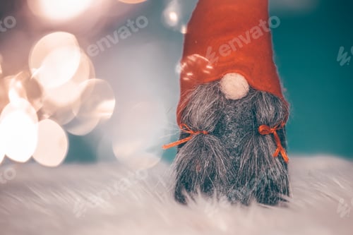 Preview: Winter Gnome with Christmas lights and ornaments. Holiday concept