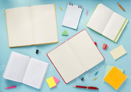 Preview: notebook and pen at abstract background