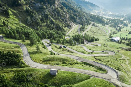 Preview: Areal view of winding road at Passo Gardena, Dolomites