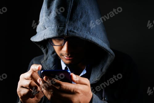 Preview: hacker hand stealing data from smart phone