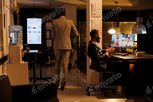 Preview: Entrepreneur having remote discussion with company team
