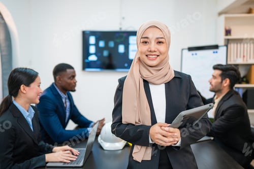 Preview: Successful businesswoman working at her office desk