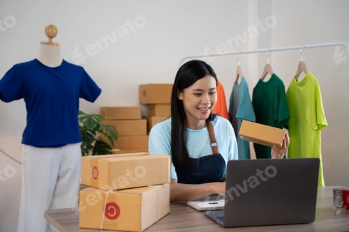 Preview: Woman Running Business From Home. Shipping shopping online, young start up small business owner pack
