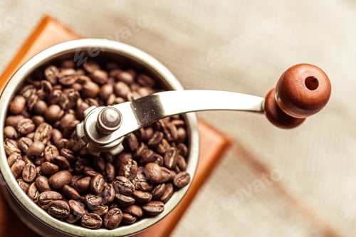 Preview: Coffee grinder with fresh coffee beans ready for preparation and brewing process
