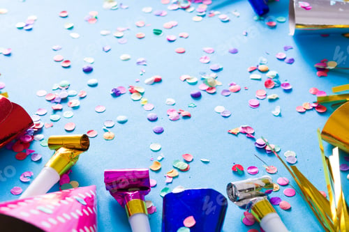 Preview: Colorful party favors and confetti creating festive atmosphere